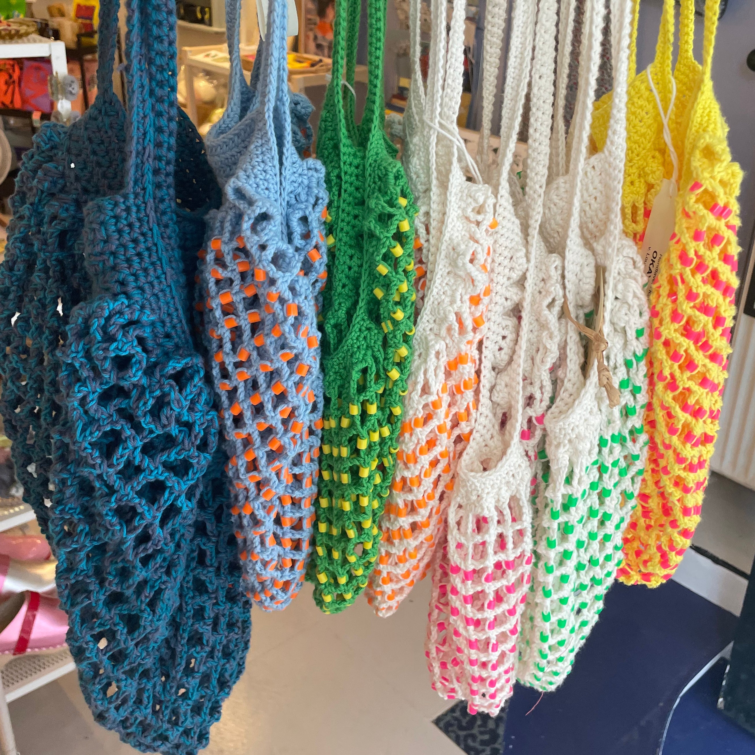 Green tote bag with yellow beads