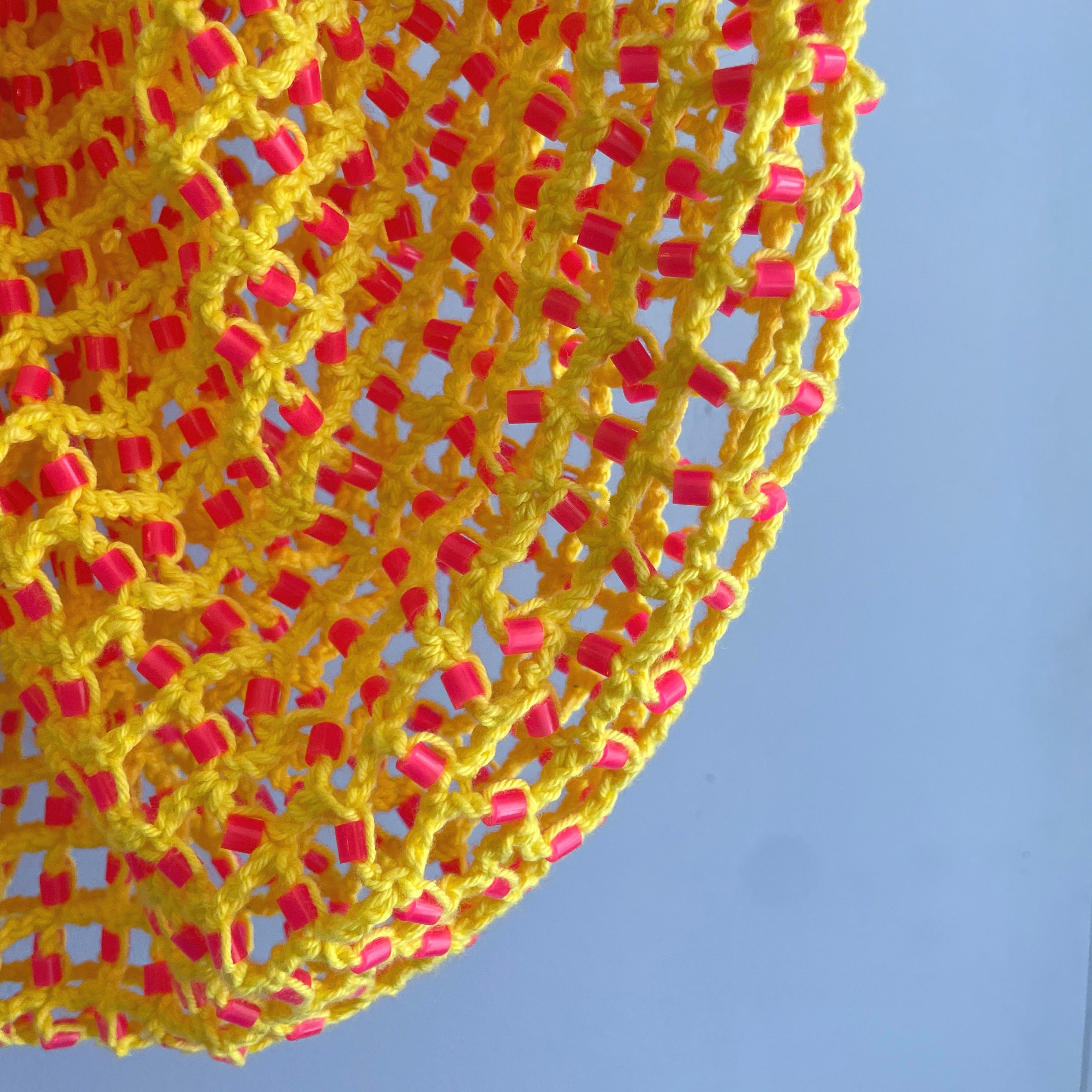 Yellow tote bag with pink beads