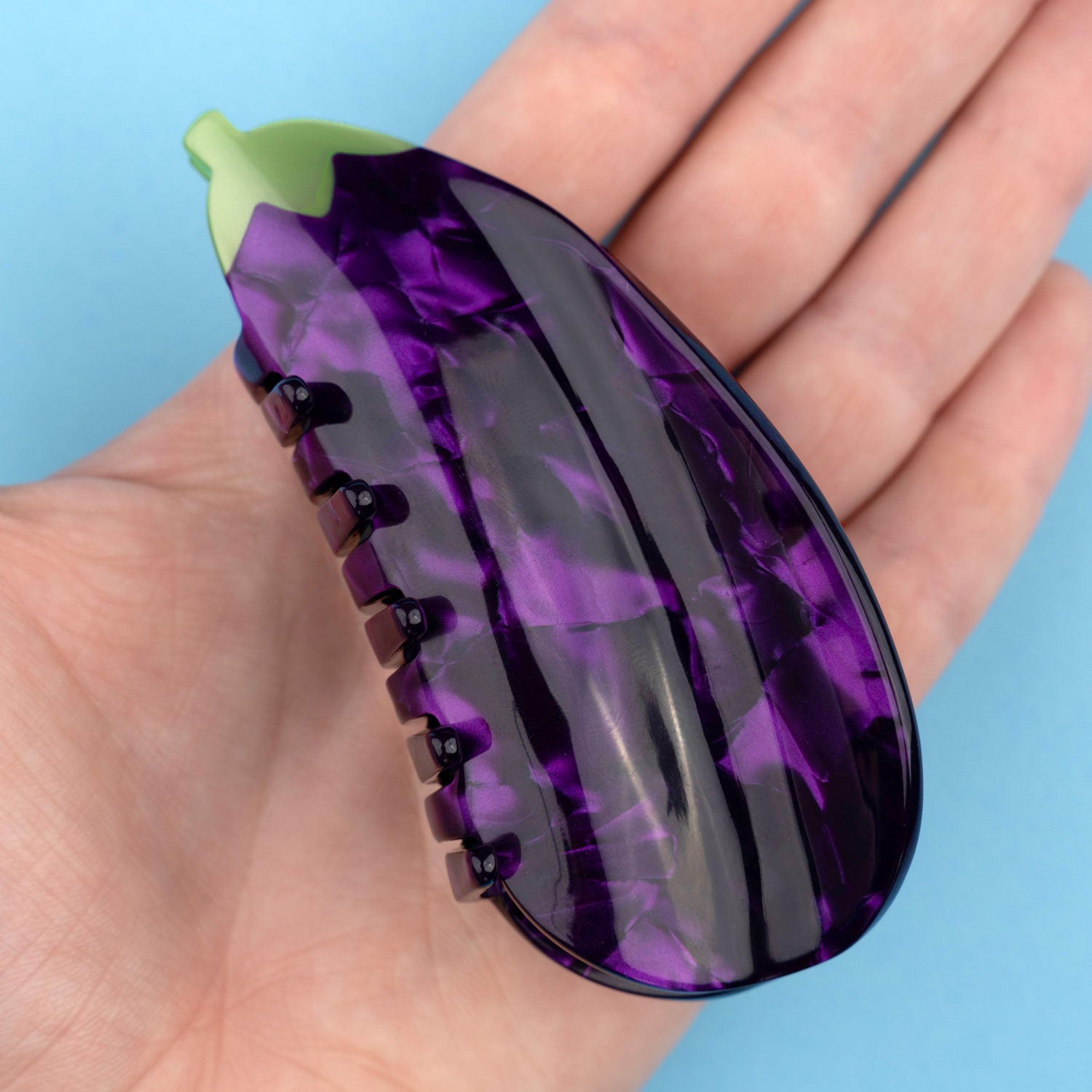 Aubergine, hårklemme