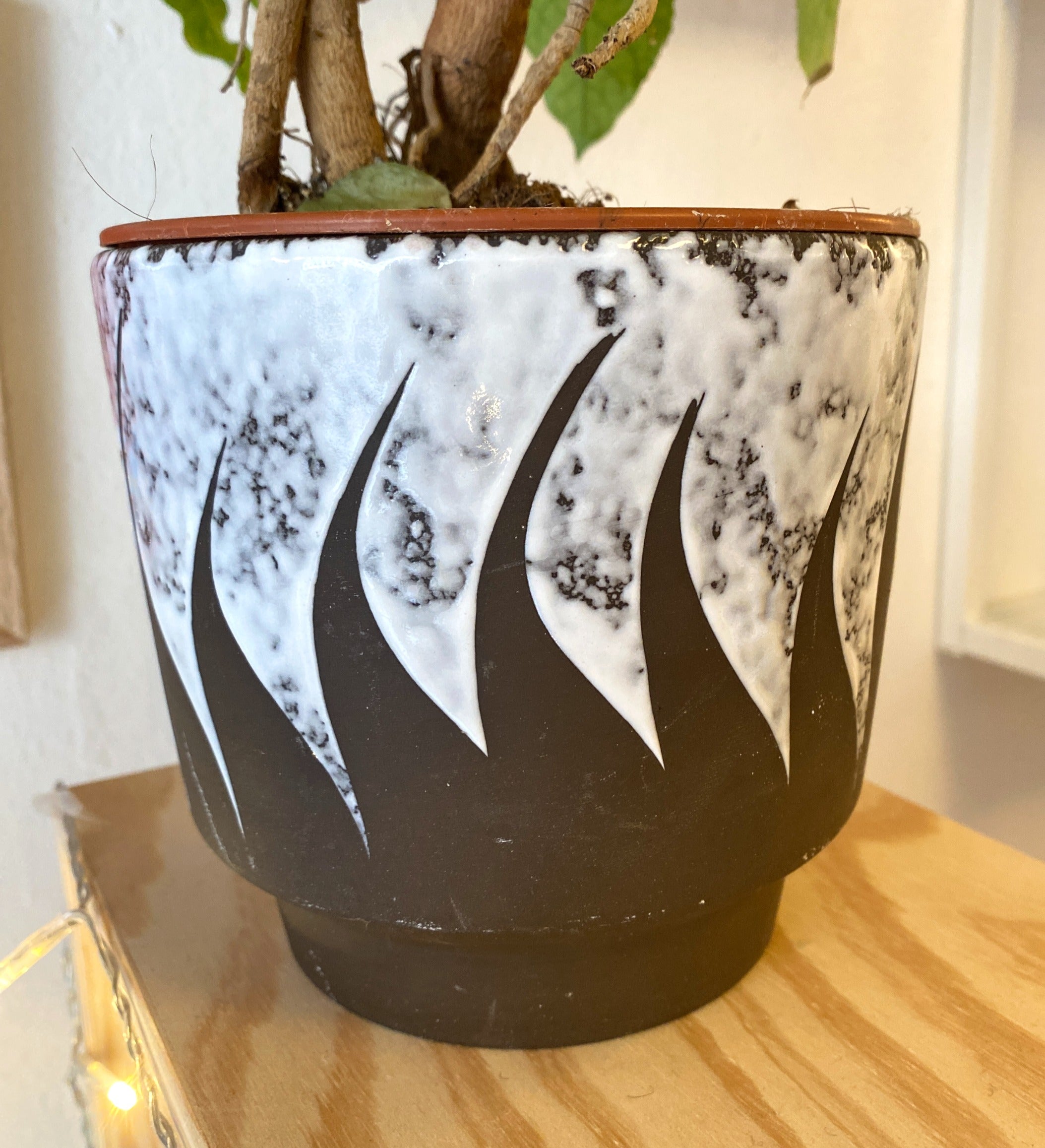 Keramisk potteskjuler