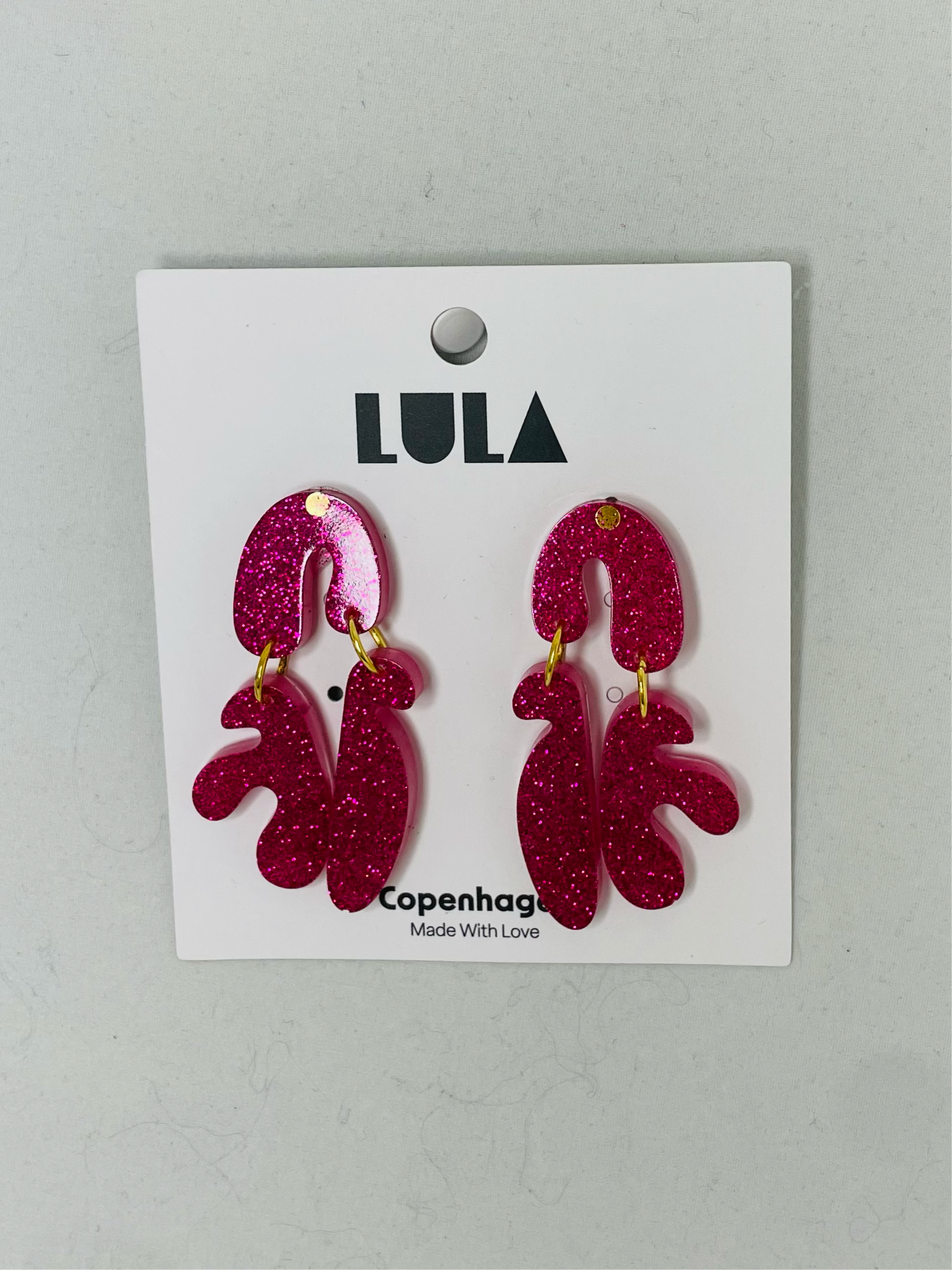 Grafisk ørestikker, hot pink