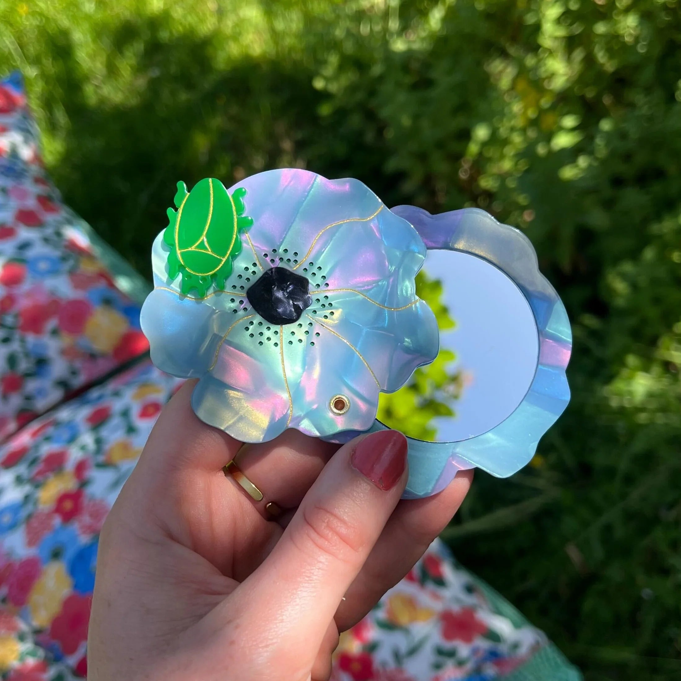 Blå blomst, Håndspejl