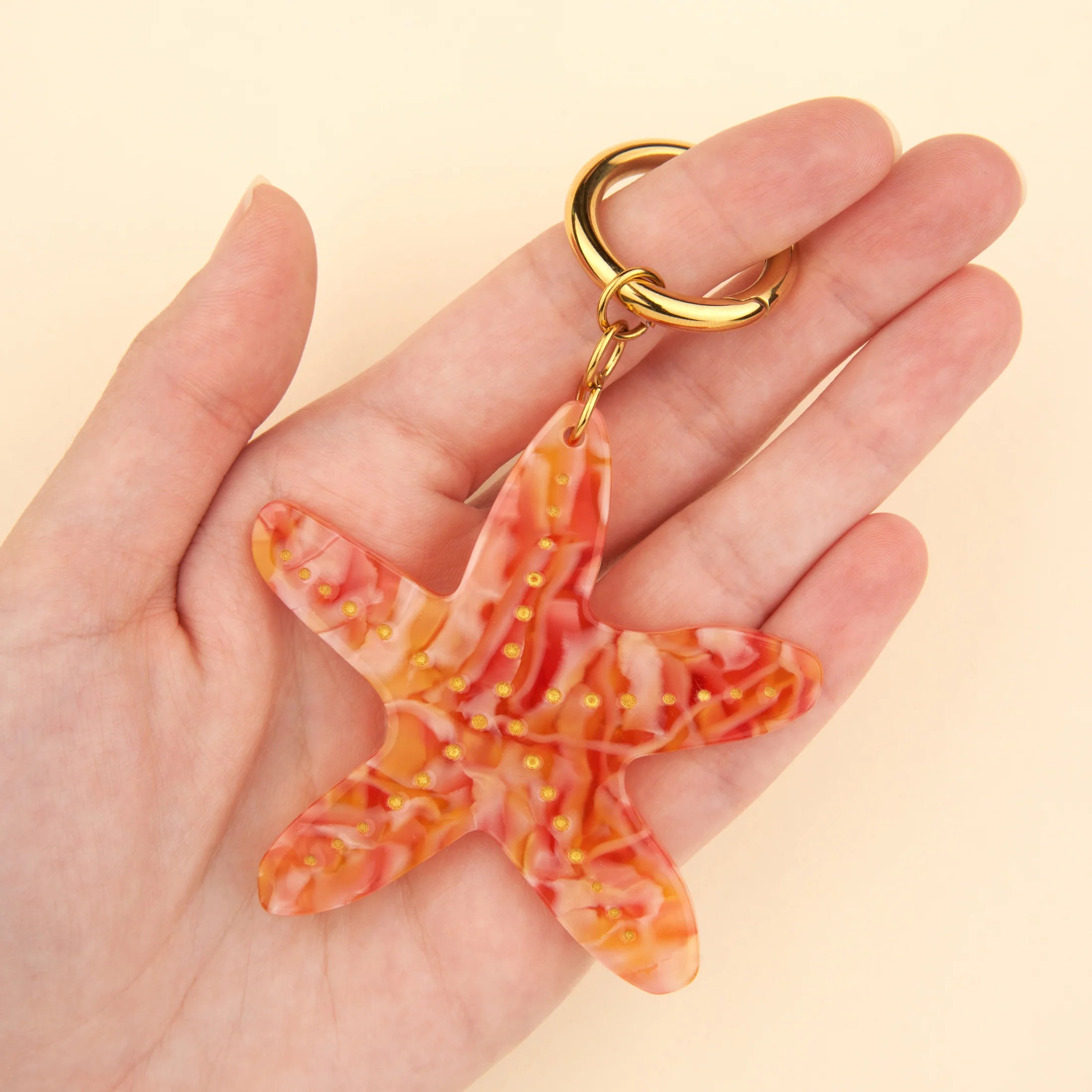 Søstjerne bag charm