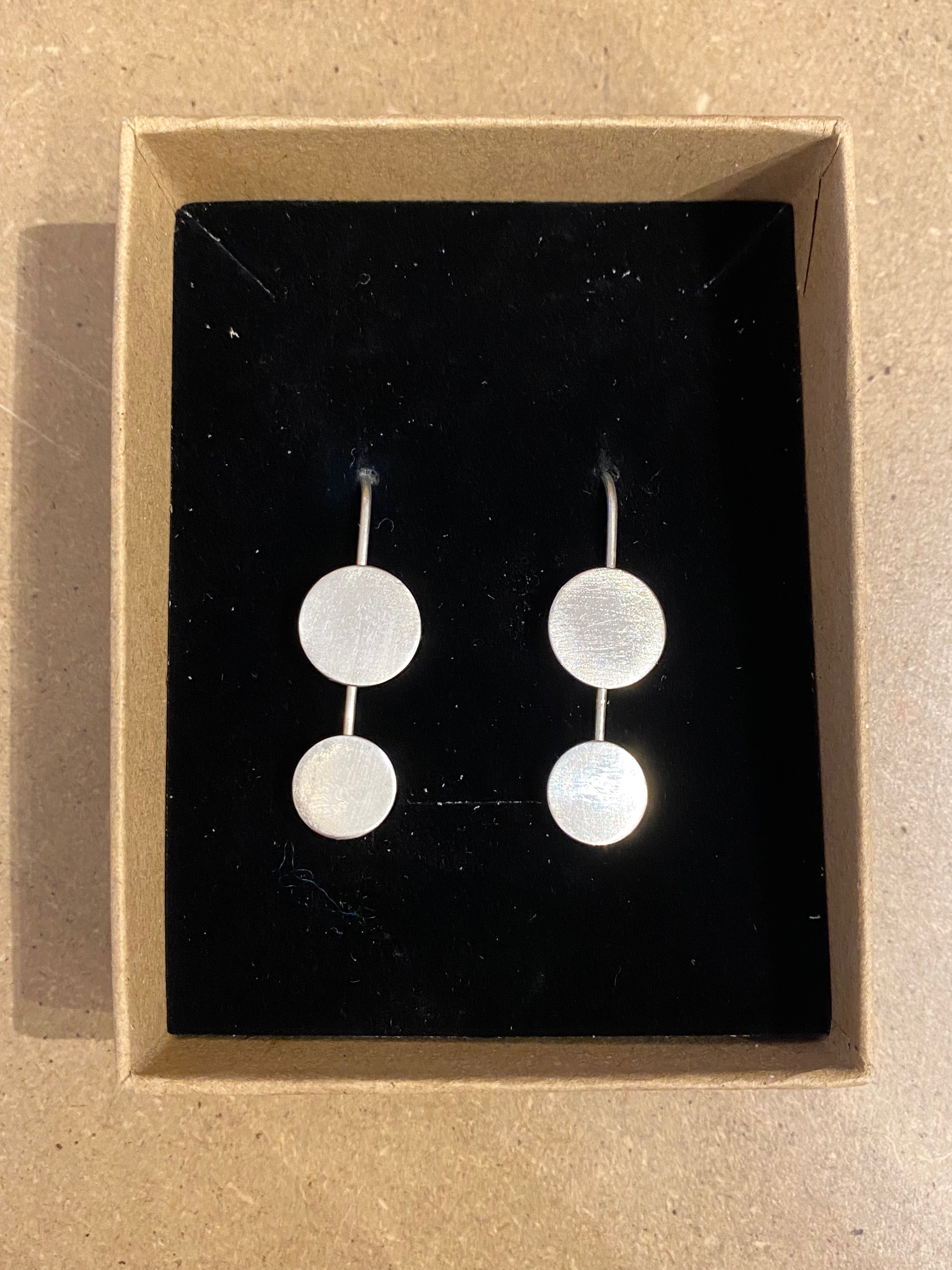 Ørestikker med sølvplader