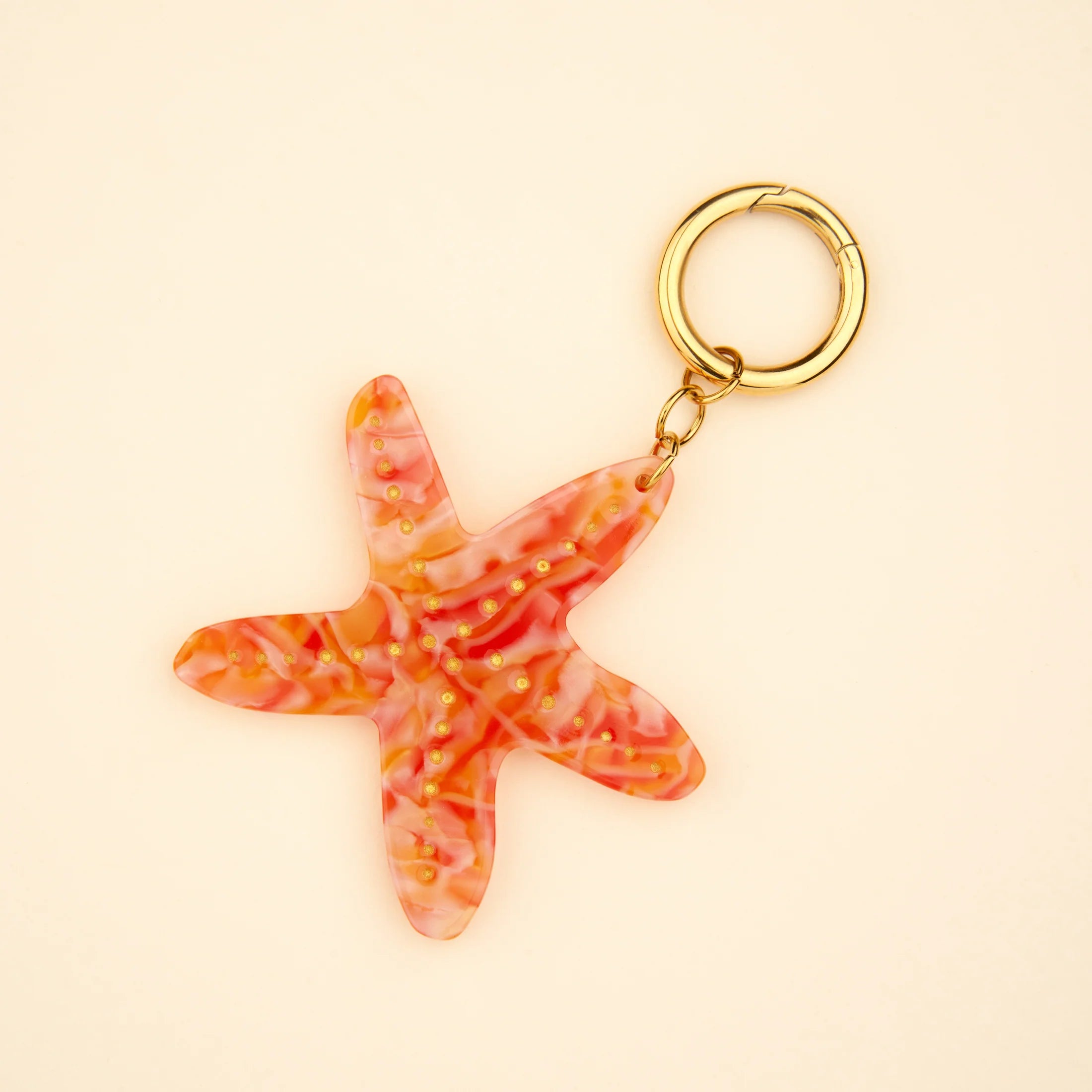 Søstjerne bag charm